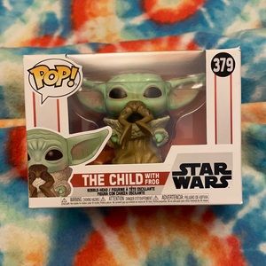 Never opened Funko POP the child with frog